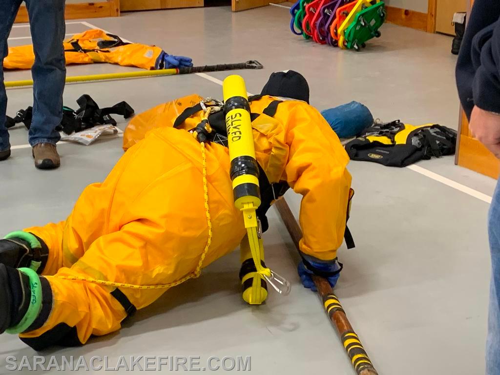 SLVFD members practice surface ice rescue techniques on dry land in a controlled setting prior to going out on the actual ice