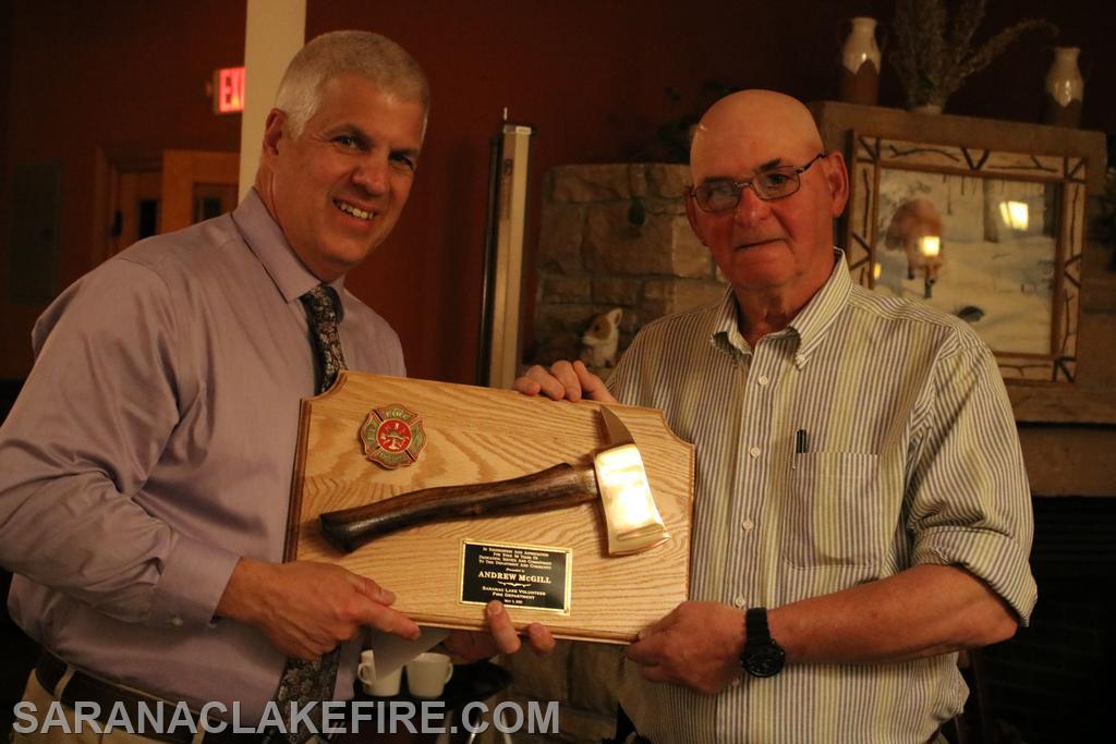 Chief Keough presents award to Andy McGill for achieving 50 years of service with the SLVFD.