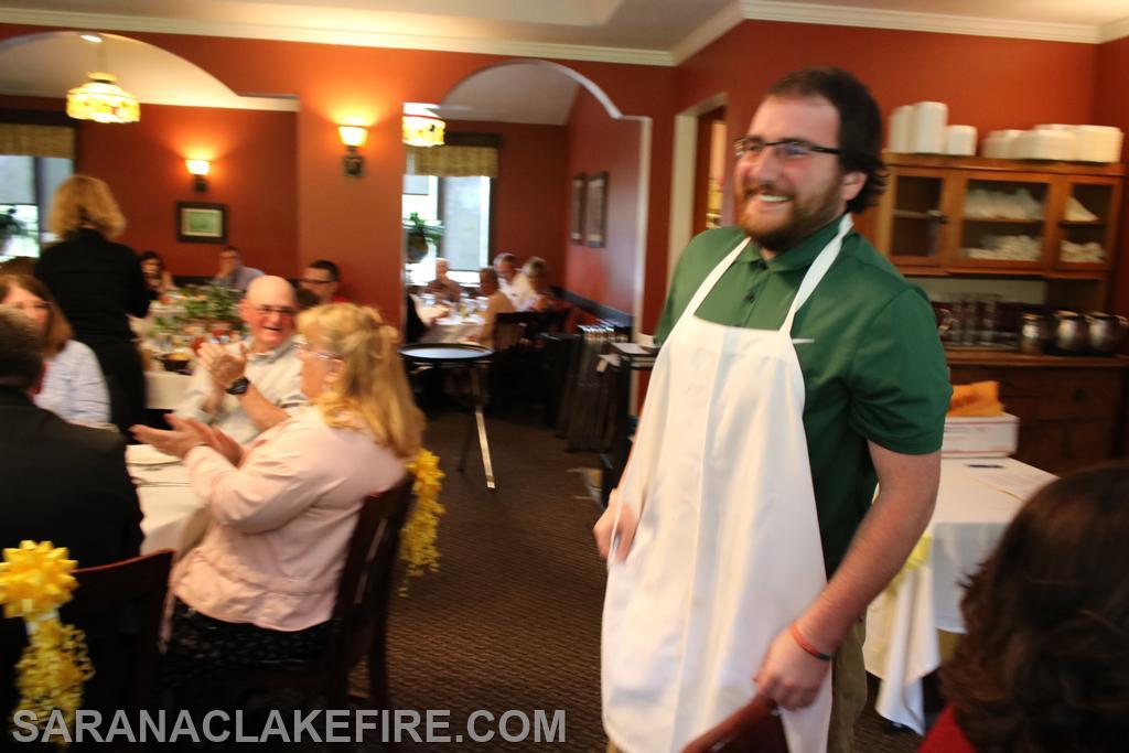 MC Dobson called Adam Mayville, SLVFD's newest rookie in the room, to the front and as a GAG was presented with an apron, and assigned KP for the nights meal.