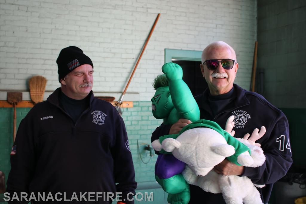 SLVFD member Mike Boon delivers toys.