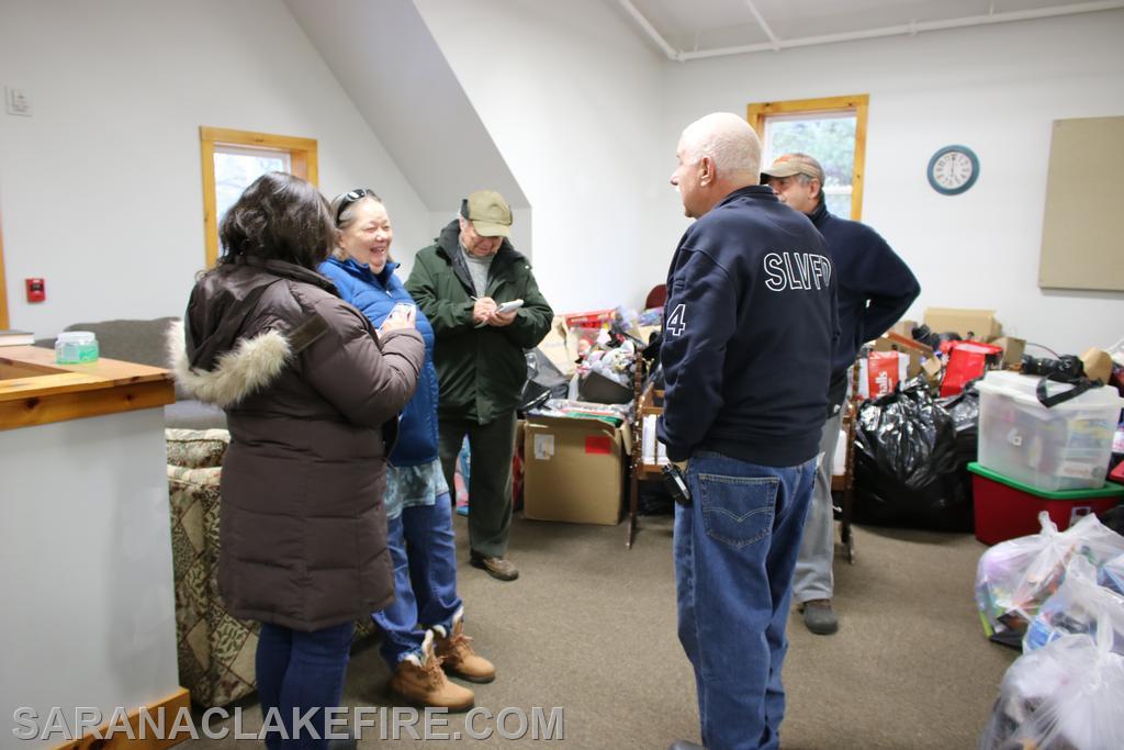 Reporter Jack Laduke was on hand to survey the huge pile of presents and interview Holiday Helpers representatives.